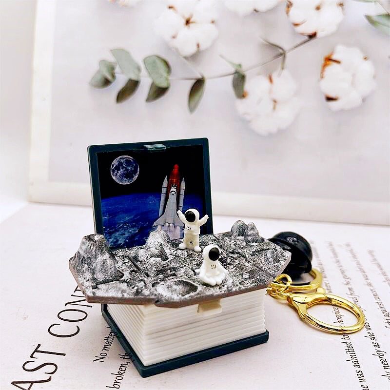 Wholesale 3D Stereo Explosive Book Magic World Magic Book Plastic Keychains